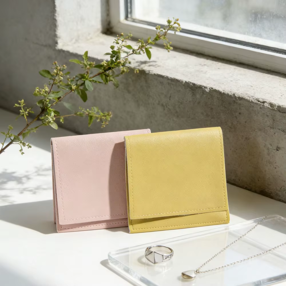 100 pochettes en cuir PU pour bijoux