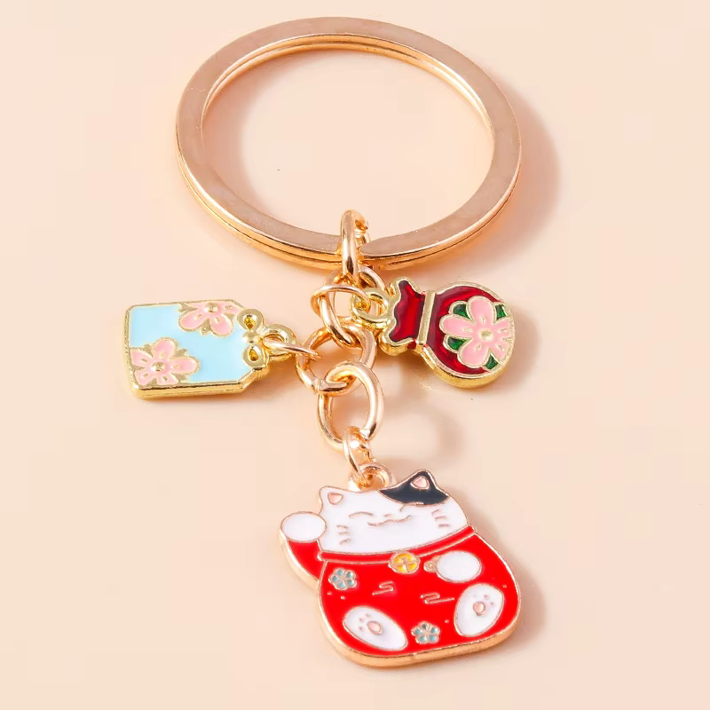 Porte-clés chat porte-bonheur en émail