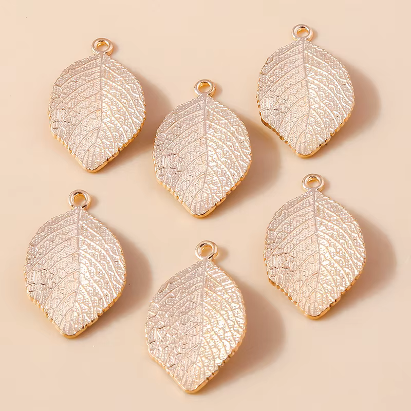 Leslie 10 pièces 31*18mm métal couleur or feuilles breloques pendentifs pour bijoux à bricoler soi-même faisant des accessoires à la main collier Bracelets