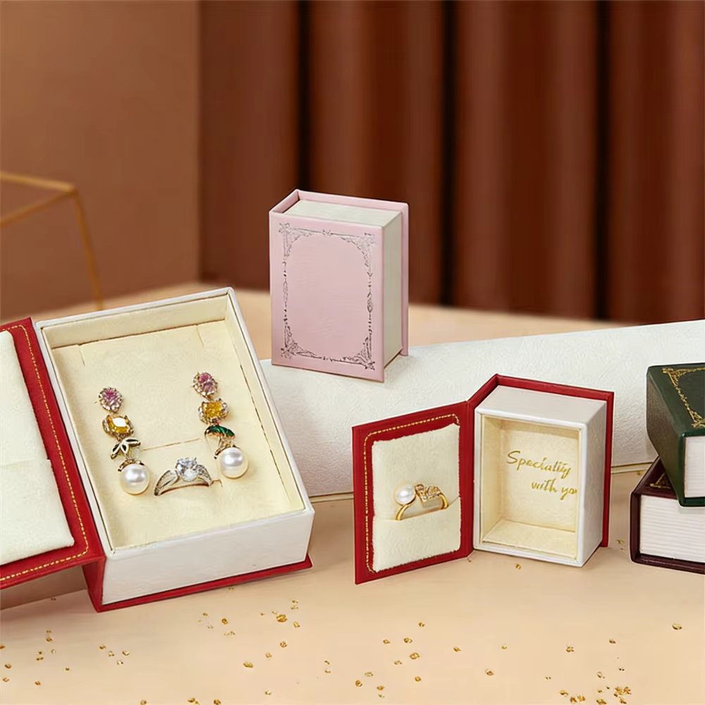 Boîte à bijoux magnétique en forme de livre